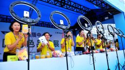 QINGDAO, CHINA - AUGUST 02: Online anchors sell local products via livestreaming at Gold Sand Beach Beer Square on August 2, 2020 in Qingdao, Shandong Province of China. (Photo by Yu Fangping/VCG via Getty Images)