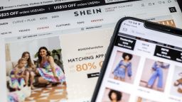 The SheIn application and website arranged on a smartphone and a tablet in Hong Kong, China, on Friday, May 21, 2021. As with so many online phenomena, Gen Z and young millennial shoppers have propelled Shein's rise, in thrall to the company's never-ending, always-changing catalog of clothes at prices that stretch even the most meager allowance.
